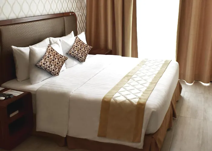 One Central Hotel&Suites